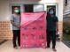 Distribusi Banner pencegahan Covid-19 kepada Perwakilan Desa Nyangau